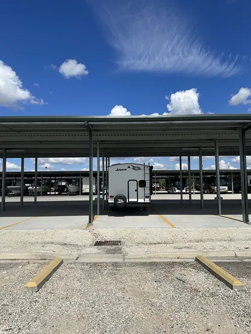 Covered, flexible storage solutions for vehicles and RVs in a protected lot. Century Storage Riverview