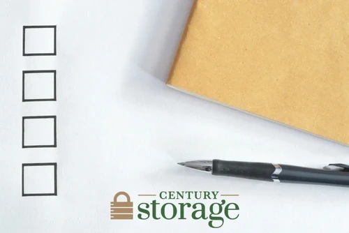 Checklist, pen and notebook and Century Storage logo